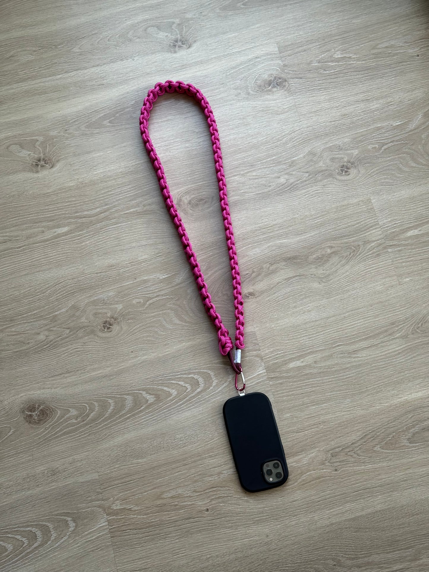 La bandoulière de téléphone