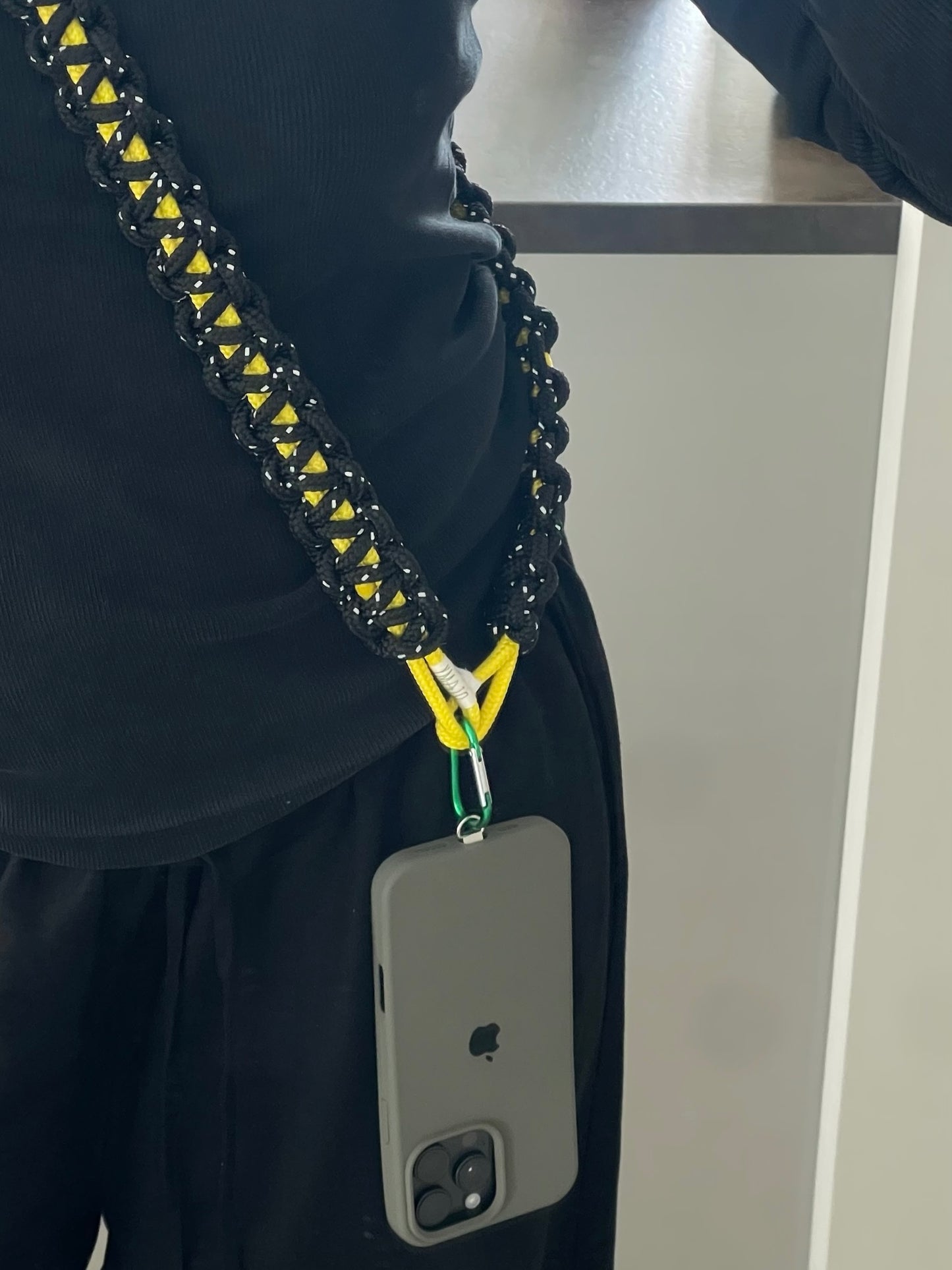 La bandoulière de téléphone