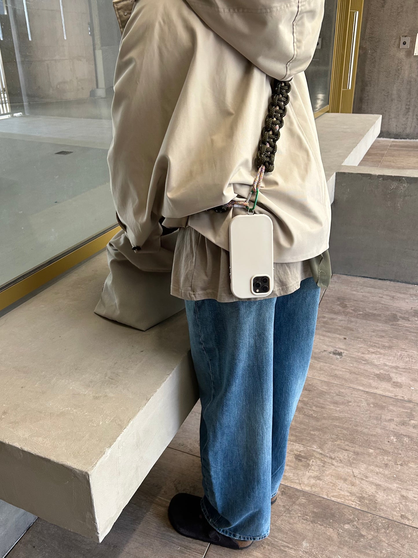 La bandoulière de téléphone