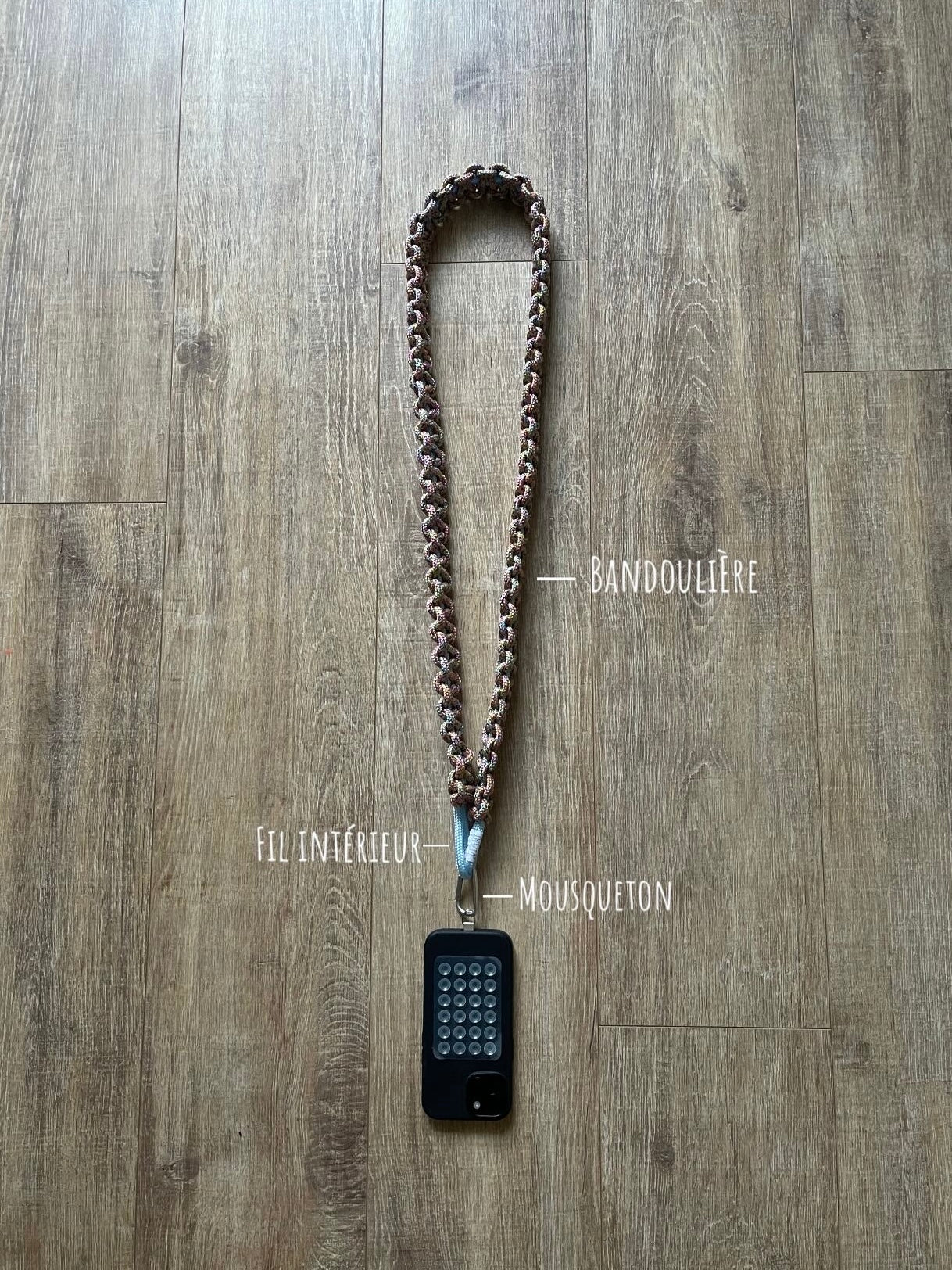 La bandoulière de téléphone