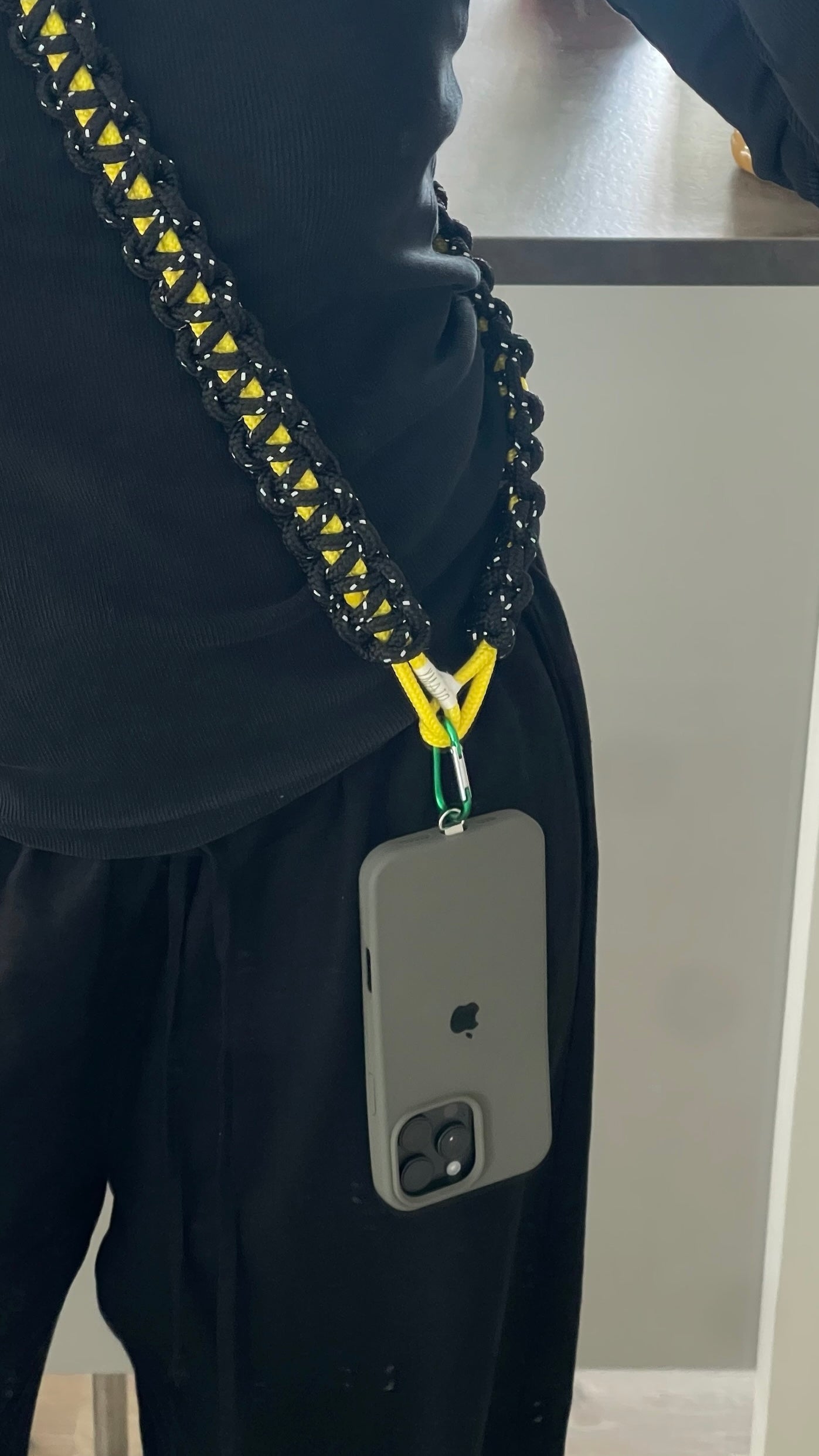 La bandoulière de téléphone