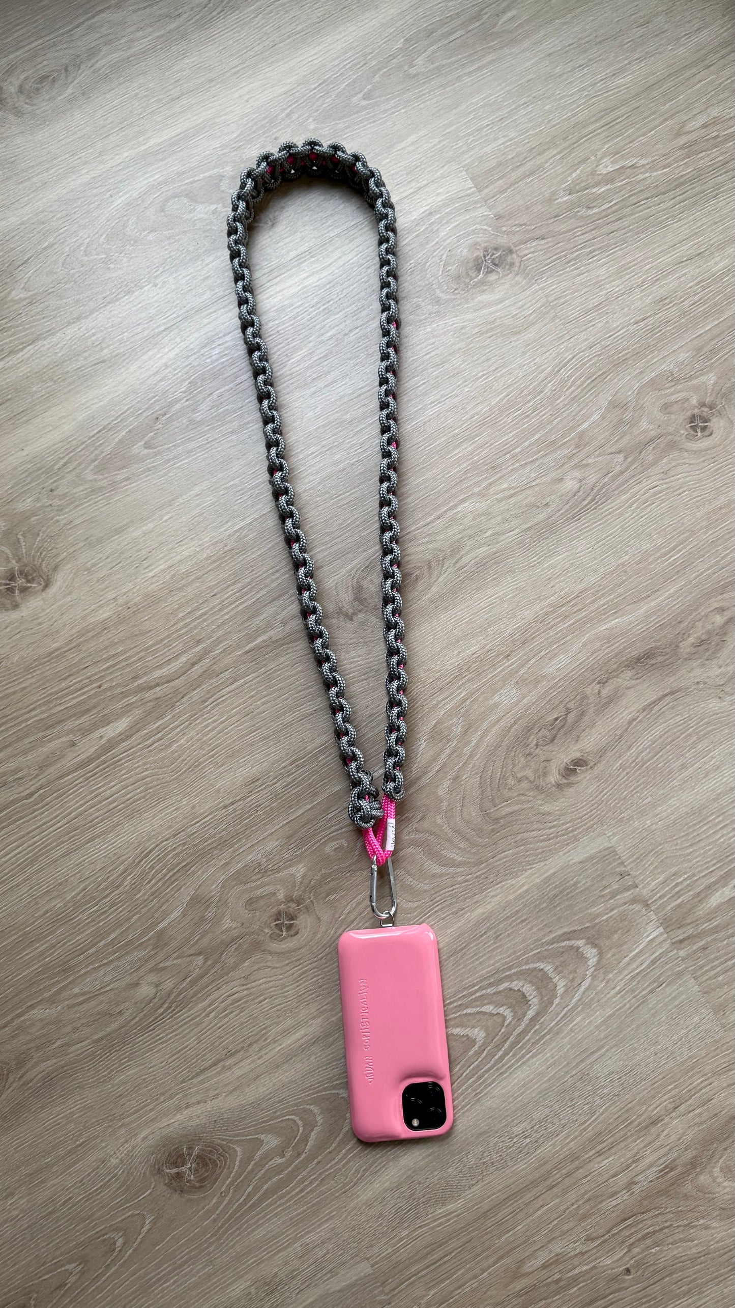 La bandoulière de téléphone